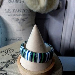 Blue green black and white bangle.  Bangle does have some wear on it due to age